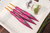 WollLolli Flame aus pink-grauem DragonWood,  Clover Nadelstärke wählbar