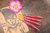 WollLolli Flame aus rosa-rotem FairyWood, NS 2,5 Clover