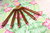 WollLolli PURE XL DeLuxe aus Palisanderholz mit pinkem Jaspis, NS 3,5